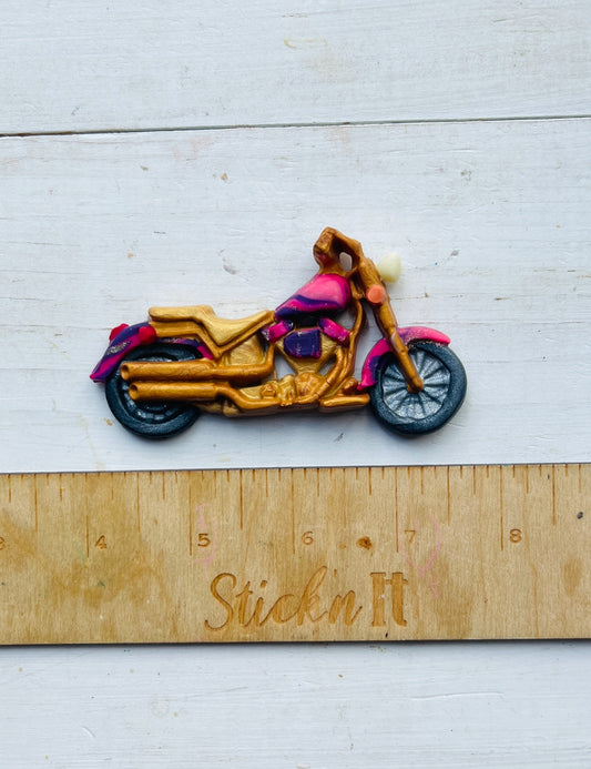 Pink and gold motorcycle